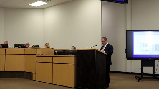 Board approves refunding bonds