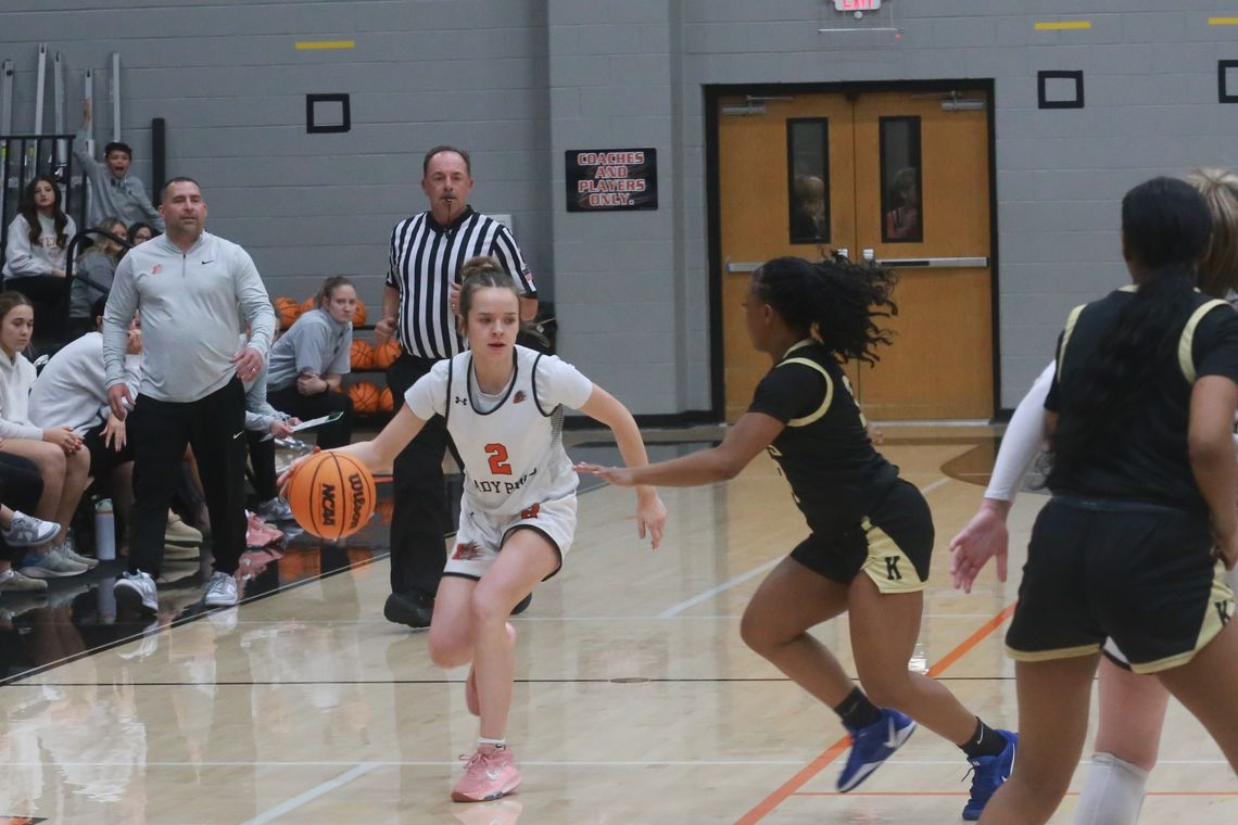 Lady roundballers stay in playoff hunt with home district win